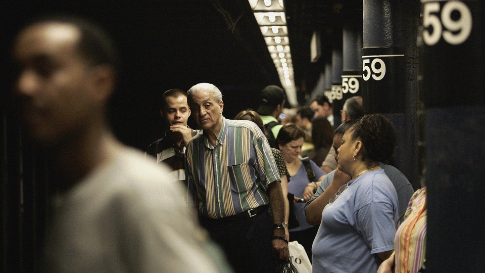 A crowded New York subway station.