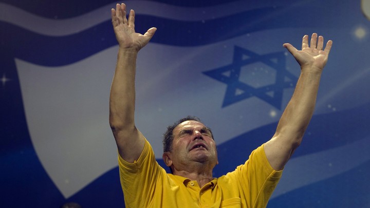 A Christian worshipper prays during an evangelical rally in Jerusalem.