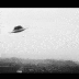 A short animation of a UFO, in the shape of a flying saucer, skipping around the sky