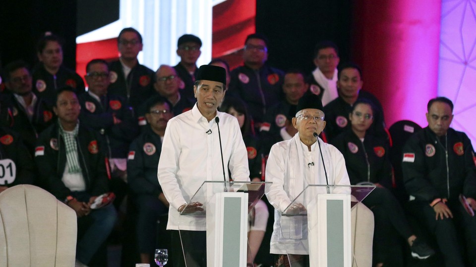 Jokowi and his running mate speak at Indonesia's first presidential debate ahead of April's elections.