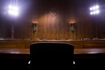 An empty chair in the Senate chambers