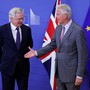 Michel Barnier, the European Commission Chief Brexit Negotiator, stands alongside David Davis, the U.K. Secretary of State for Exiting the European Union, at the resumption of Brexit talks in Brussels, Belgium on July 17, 2017.