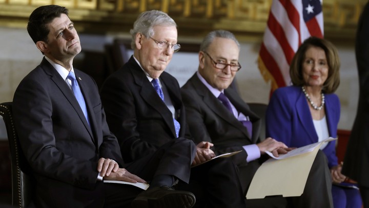 House Speaker Paul Ryan, Senate Majority Leader Mitch McConnell, Senate Minority Leader Chuck Schumer, and House Minority Leader Nancy Pelosi seated together