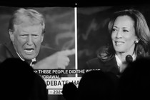 A split-screen view of Donald Trump debating Kamala Harris