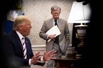 John Bolton, the national-security adviser, watches as President Donald Trump host the Romanian president in the Oval Office.