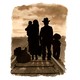 illustration of a family standing on a train track in silhouette
