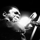 Black-and-white photo of John Coltrane performing