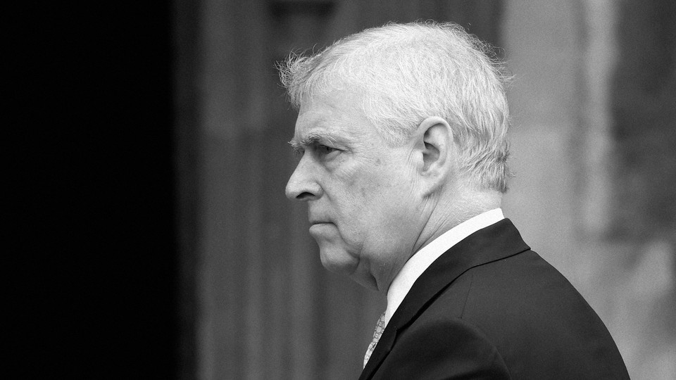 A black and white photograph of former Prince Andrew in profile
