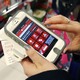 A person shops on a smartphone.