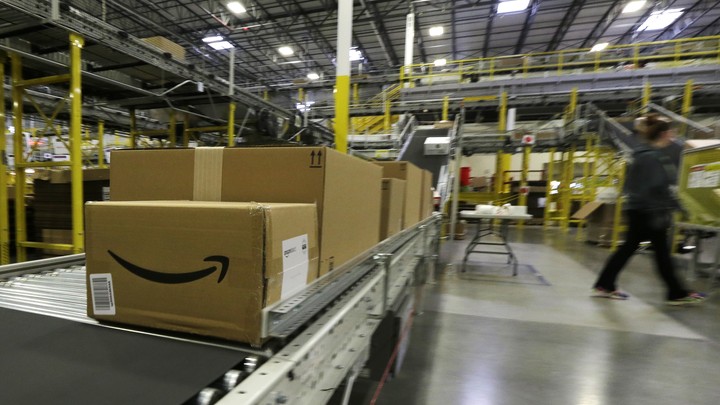 Packages on a conveyor belt at an Amazon warehouse