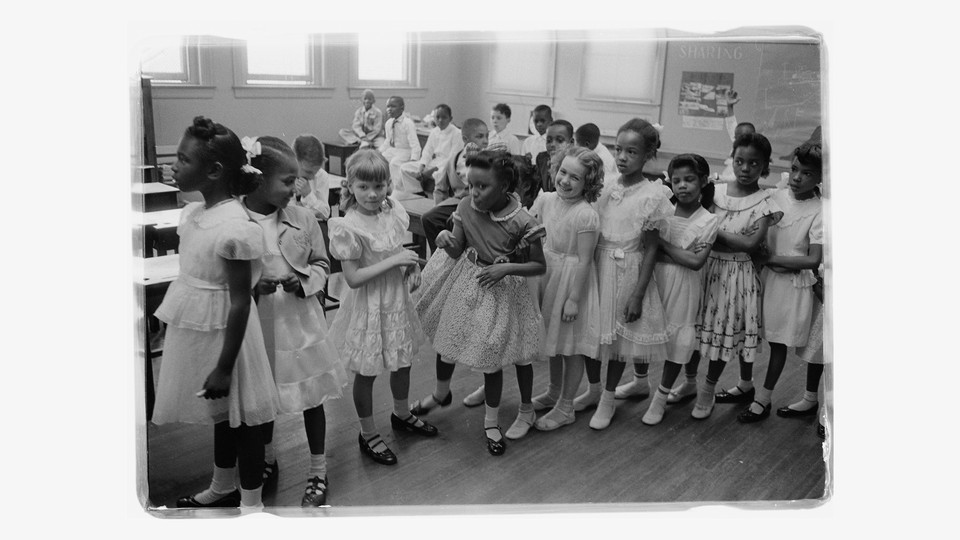 A black-and-white photo of a newly integrated classroom