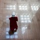 Protester dressed as a Handmaid