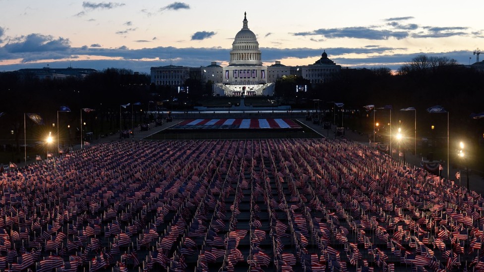 American flags decorate the National Mall near the U.S. Capitol in the early morning ahead of the inauguration of President-elect Joe Biden, on January 20, 2021, in Washington, D.C.