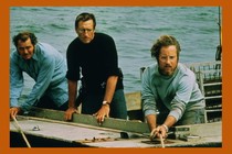 A film still of Robert Shaw, Roy Schneider, and Richard Dreyfuss in "Jaws"