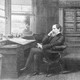 Charles Dickens in his home study