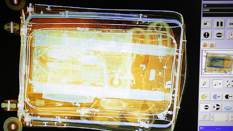 Luggage is seen on the screen of an x-ray security scanner at Sarajevo International Airport.