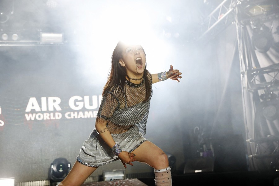 A person performs during an air-guitar championship.
