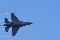 an F-16 sideways in midair