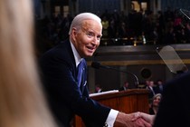 President Joe Biden shakes hands with people after delivering the State of the Union address