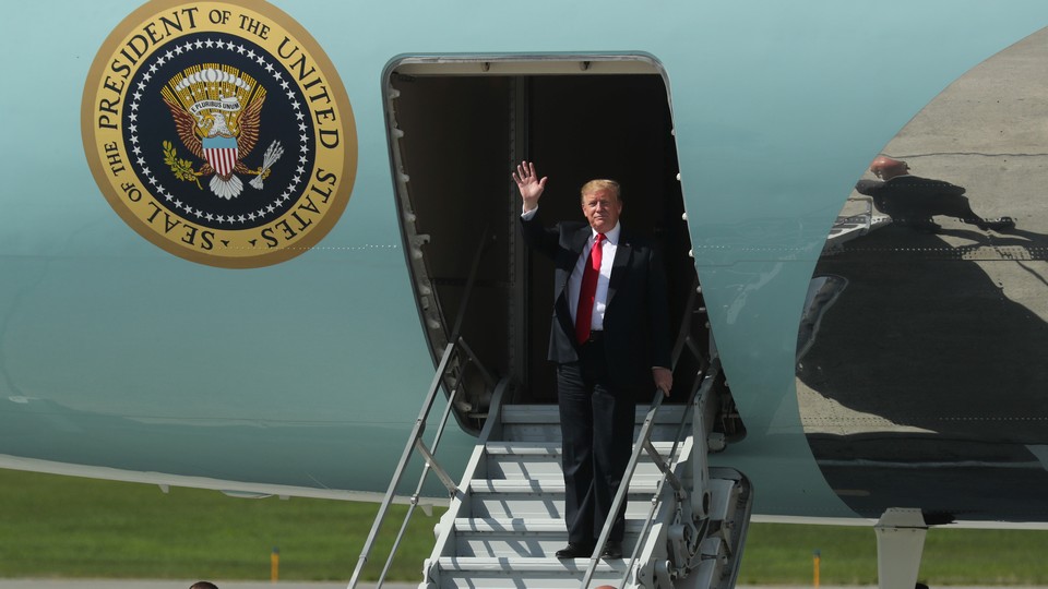 Trump waves from Air Force One.