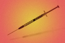 A blurred vaccine syringe