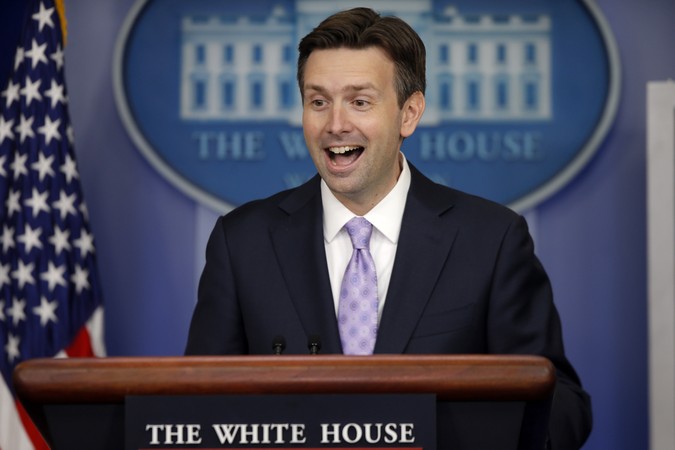 Obama surprises, thanks WH press secretary Josh Earnest during