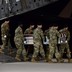 A U.S. Army carry team carried the coffin of Army Staff Sgt. Dustin Wright.