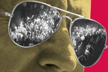 Art of Joe Biden wearing sunglasses, with photos of Charlottesville marchers reflected in the shades