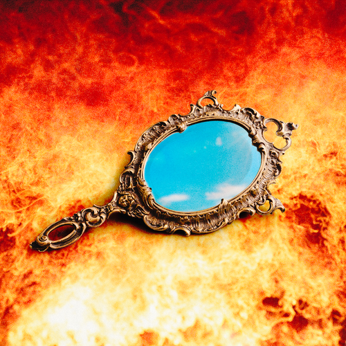 A mirror surrounded by fire