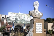 A defaced bust of Hafez al-Assad