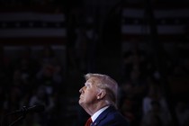 Donald Trump looks up during a campaign event