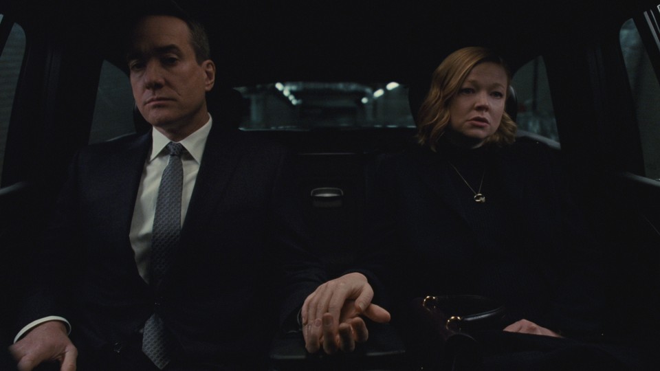 Shiv and Tom from "Succession" sitting in the back of a car in a scene from the show's finale