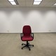 An office chair sitting in an empty room