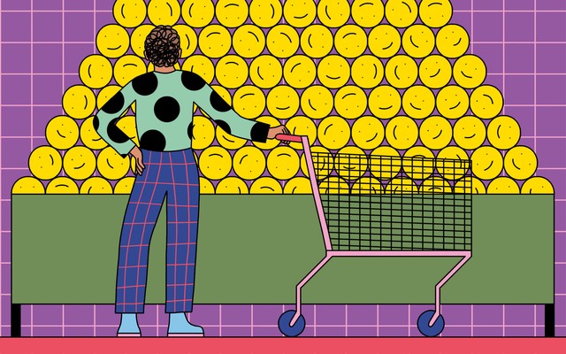 A person with a shopping cart gazes at a large pile of smiley faces