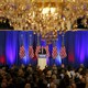 Donald Trump speaks beneath chandeliers at a press event at his Trump International Golf Club in West Palm Beach in March.