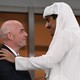 FIFA president Gianni Infantino talks with Qatar Emir Sheikh Tamim bin Hamad Al Thani during a match.