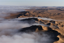 Fog rolling into the dunes of the Namib desert