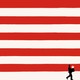 an illustration of the American flag without stars, while in the foreground a figure walks while carrying a box with a star