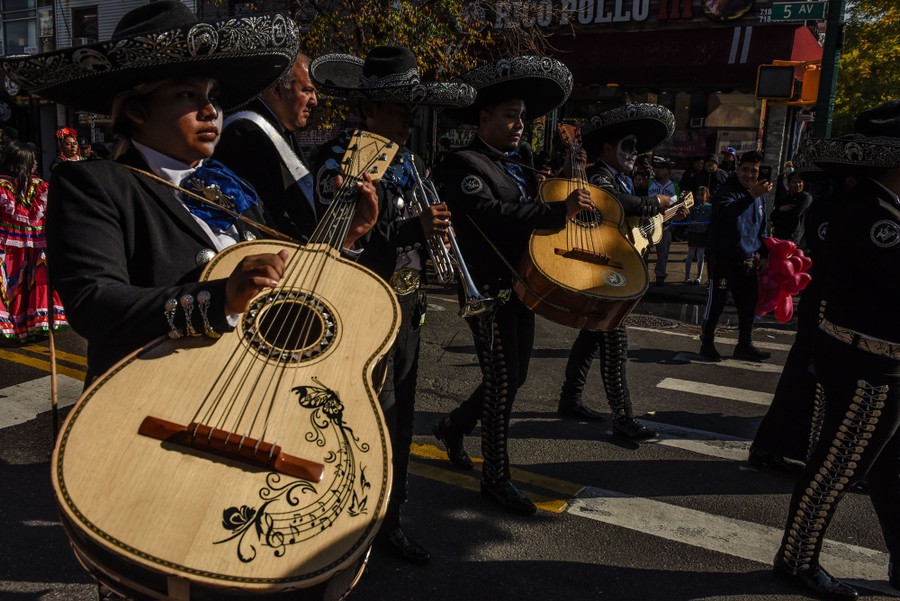 Musical performers take part in a parade.