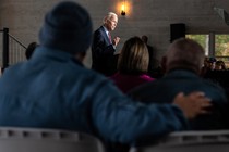 Biden speaking to a room full of people