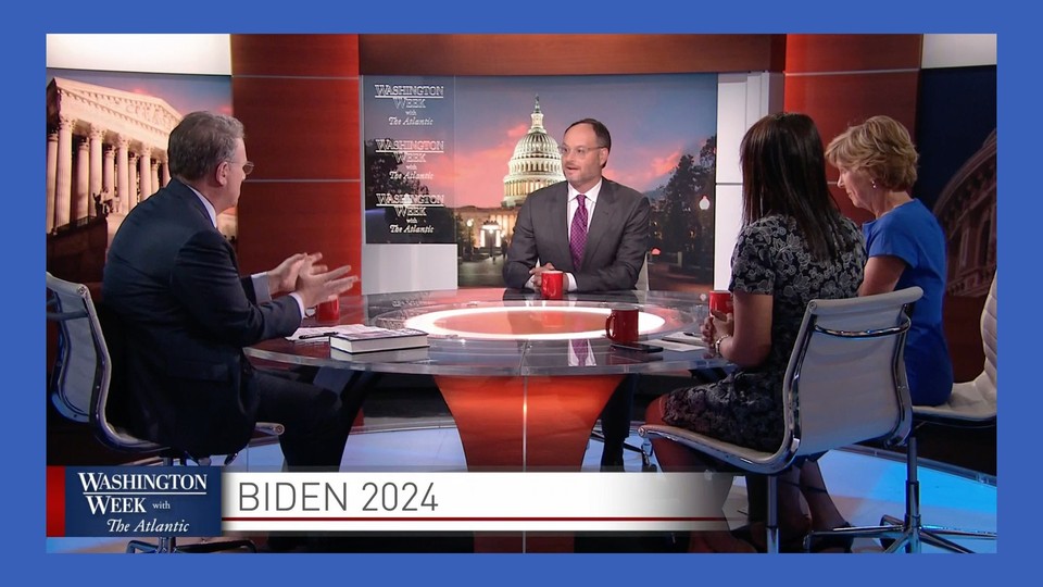 Visitors talk around a table on the current episode of Washington Week With the Atlantic