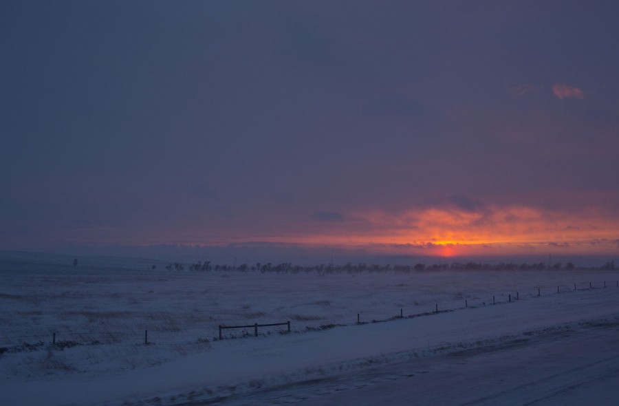 The sun sets after a winter blizzard descends on the camp just outside of the Lakota Sioux reservation of Standing Rock, North Dakota, on December 5, 2016.