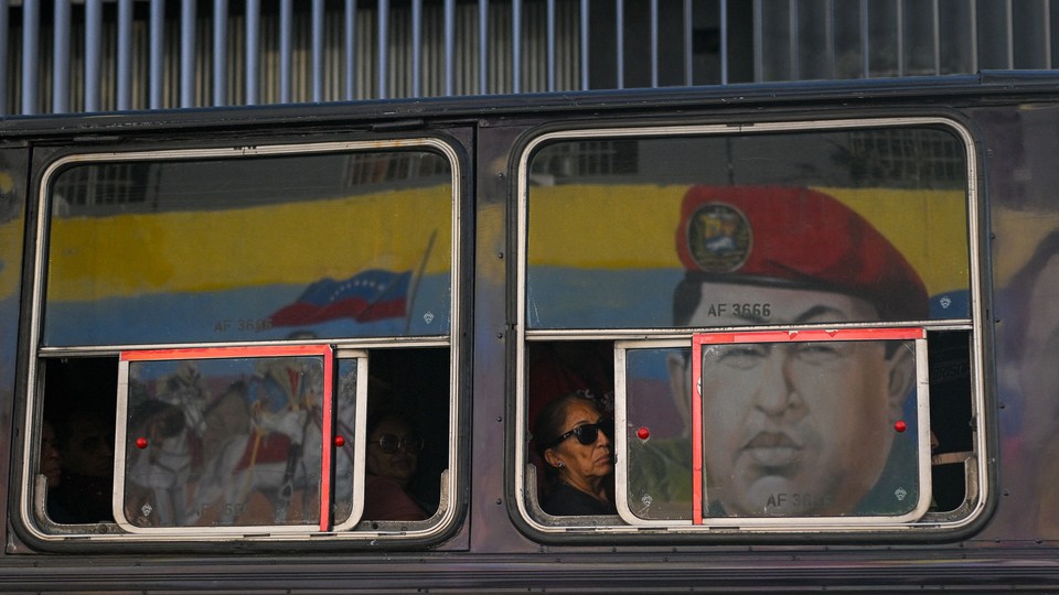 Photo of a bus in Venezuela with an image of Hugo Chavez