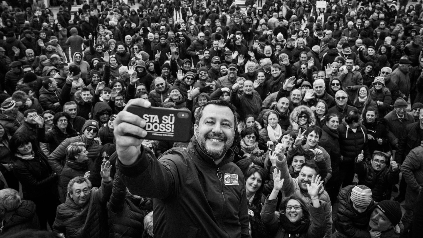 Matteo Salvini poses for a selfie with dozens of his supporters.