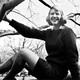 A photo of Sylvia Plath sitting in a tree, taken while she was a student at Smith College