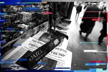 The cover of the Wall Street Journal is seen with other papers at a newsstand in New York on November 9, 2016. 