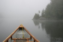 A canoe on foggy Lake Ontario