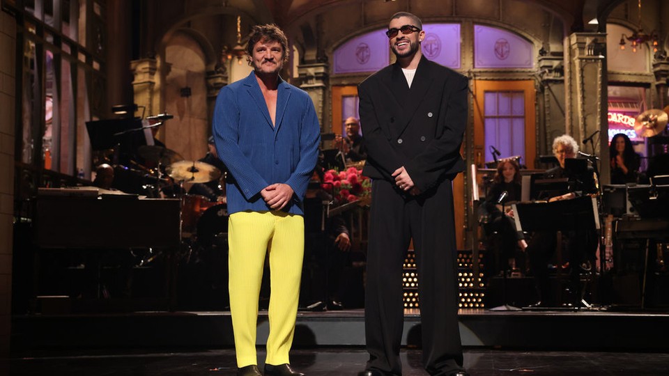 Pedro Pascal and Bad Bunny standing on the 'SNL' stage during the latter's monologue