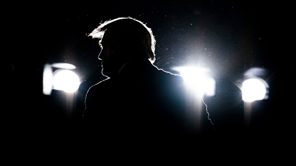 Donald Trump's profile, backlit