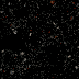 A sphere of small particles expands and contracts against a black background.